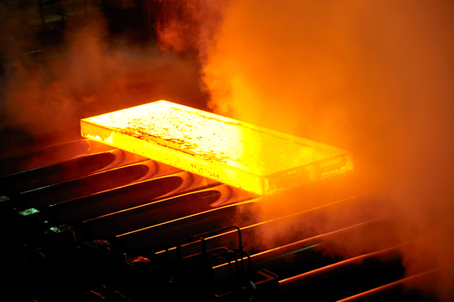 Hot steel on conveyor