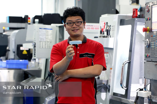 CNC machinist with putter