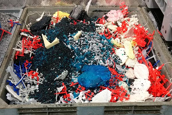 Variety of colorful plastics in a container