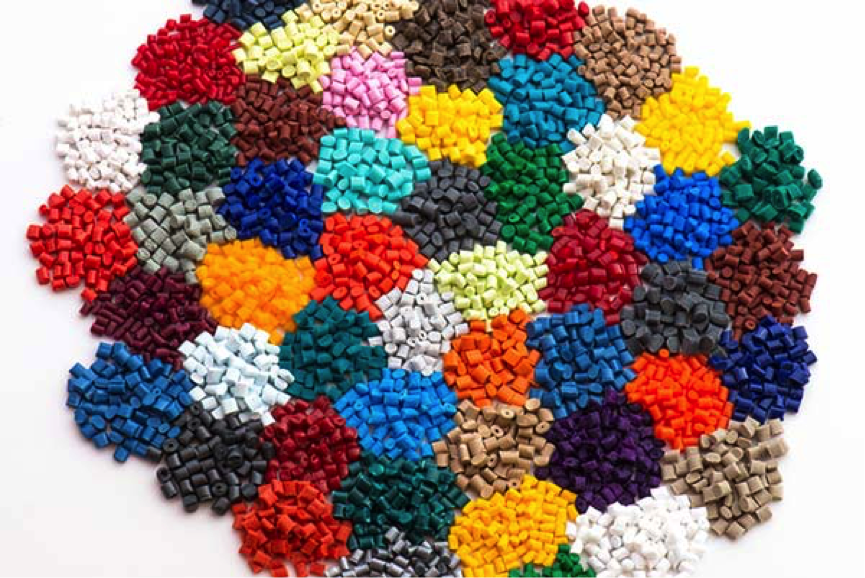 Plastic pellets arranged in a colorful display