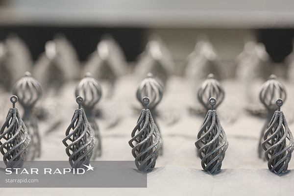 Close-up of V. Nunes 3D printed spinner earrings
