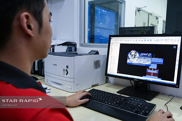 Programmer using Vericut software at Star Rapid