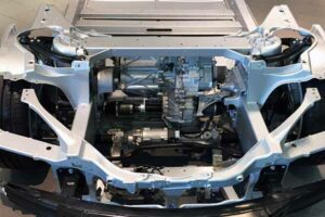 Vacuum impregnated aluminum car frame