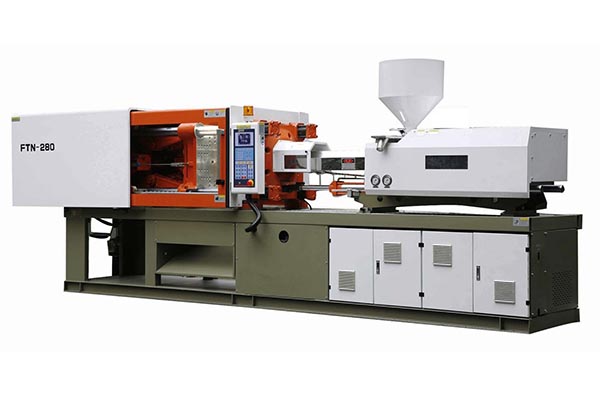 A standard plastic injection molding machine