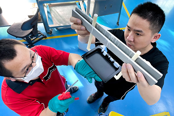 Technicians preparing a master model for vacuum casting at Star Rapid